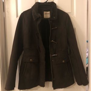 A chocolate brown fall or winter coat.